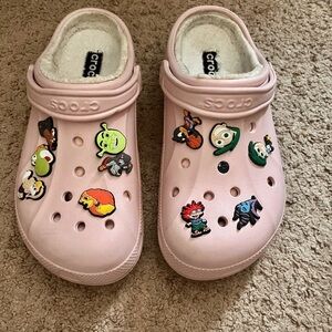 Pink Lined Crocs With Jibbitz